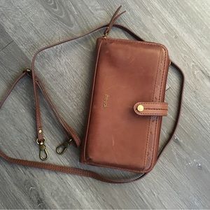 The SAK crossbody bag/wearable wallet. Adjustable removal straps